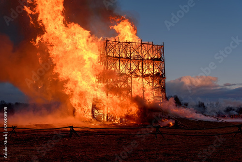 Fotografie Building in inferno of flames