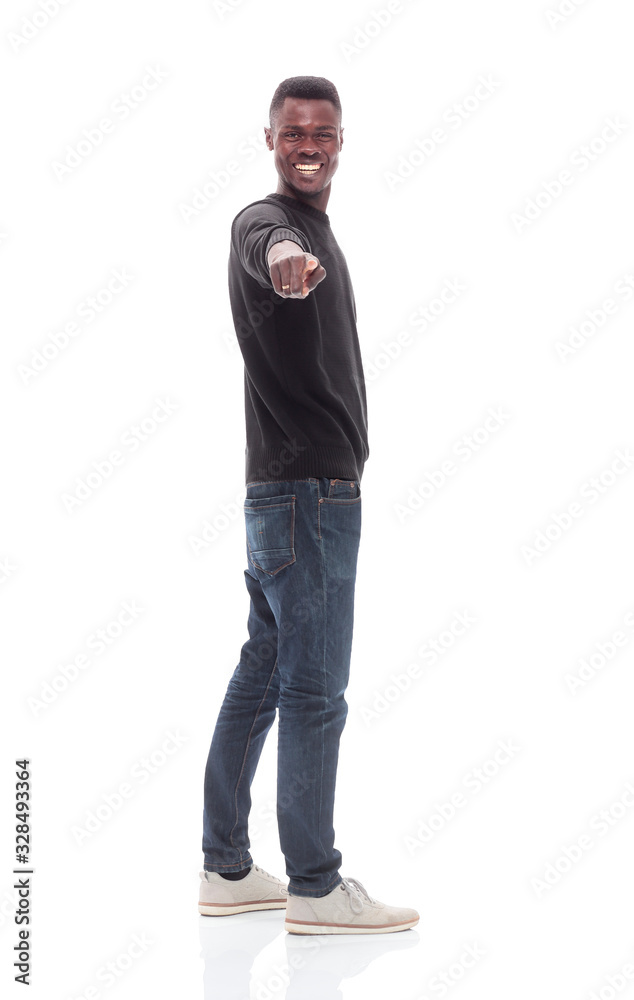 smiling handsome man pointing at you . isolated on white smiling handsome man pointing at you . isolated on white