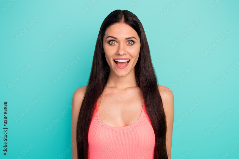 Portrait of astonished girl hear wonderful black friday bargains impressed scream wear pastel tank-top isolated over green color background Portrait of astonished girl hear wonderful black friday bargains impressed scream wear pastel tank-top isolated over green color background