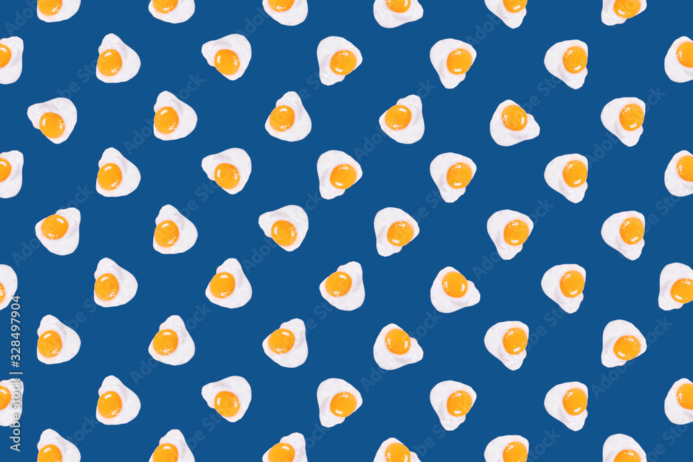 Fried eggs pattern on blue background. Fried eggs pattern on blue background.