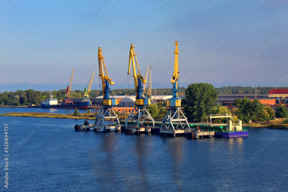 Industrial port with cranes and containers