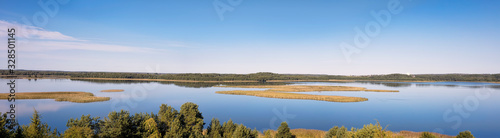 Beautiful panoramic view of the lake on a summer day. Belarus. Braslav lakes.