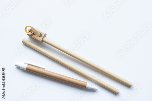 Eco-friendly materials in the production of office supplies. Wooden pencil, pen and sharpener