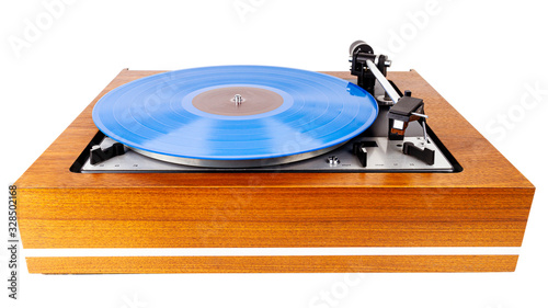 Vintage turntable with a blue vinyl isolated on white