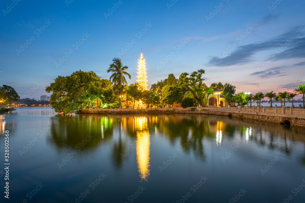 Tran Quoc pagoda, the oldest Buddhist temple in Hanoi, at twilight. The famous destination travel in Hanoi