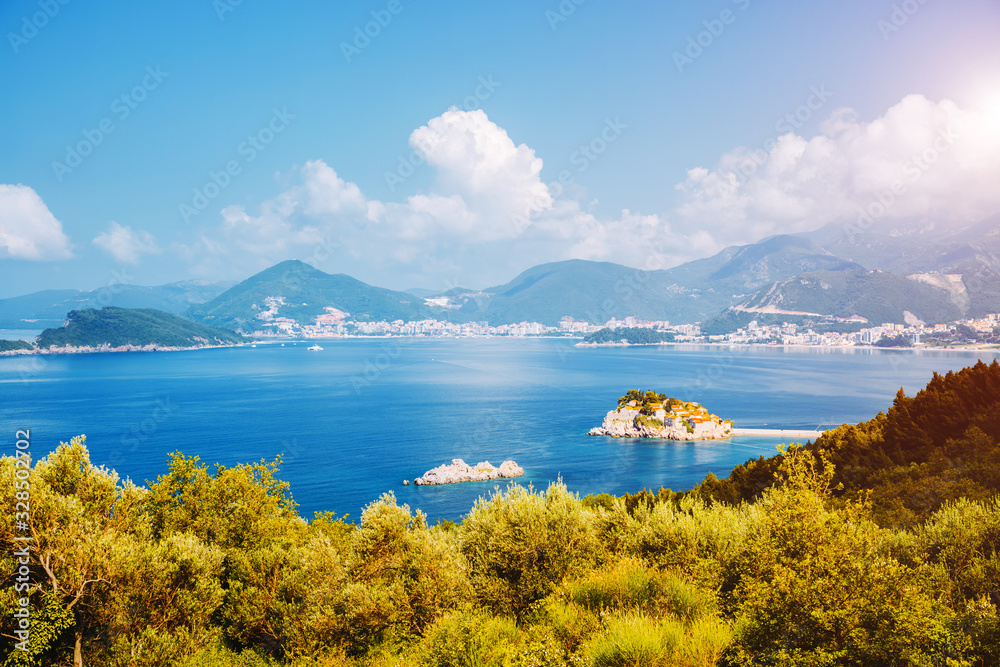 Aerial view of the small islet Sveti Stefan in sunny day. Location place Montenegro, Balkans.