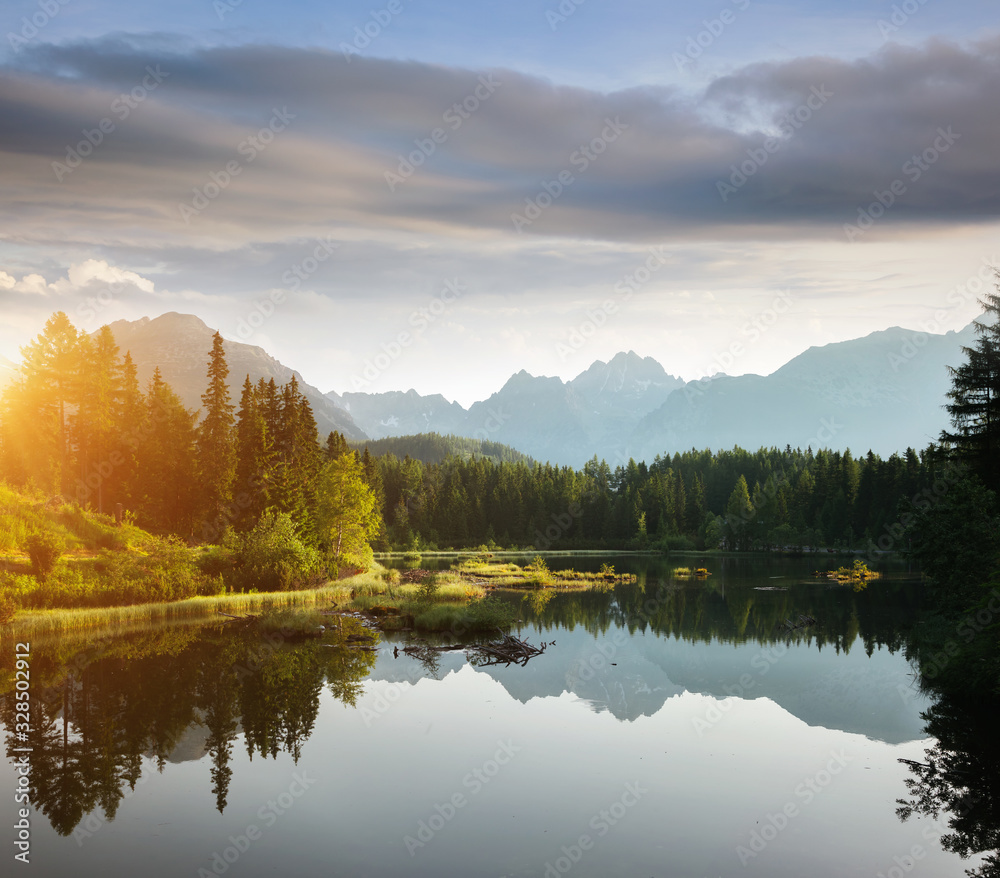Fototapeta premium Calm mountain lake in National Park High Tatra. Location place Strbske pleso, Slovakia, Europe.