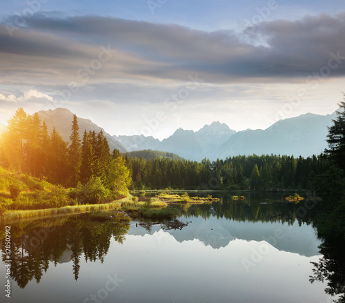 Calm mountain lake in National Park High Tatra. Location place Strbske pleso, Slovakia, Europe. © Leonid Tit