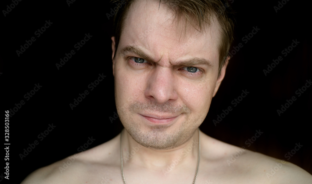 Portrait of a young man with surprised face. Portrait of a young man with surprised face.