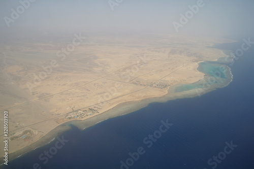 Obraz na płótnie Top view on the desert of Egypt.Rred sea. Aerial view from the plane w salonie