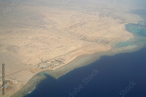 Obraz na płótnie Top view on the desert of Egypt.Rred sea. Aerial view from the plane w salonie