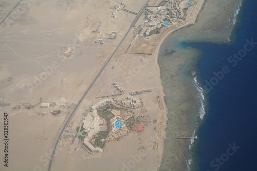 Obraz na płótnie Top view on the desert of Egypt.Rred sea. Aerial view from the plane w salonie
