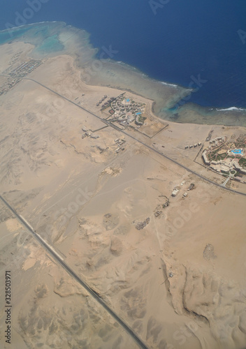 Obraz na płótnie Top view on the desert of Egypt.Rred sea. Aerial view from the plane w salonie