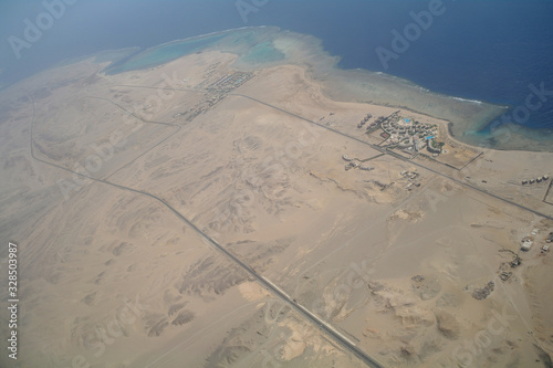 Obraz na płótnie Top view on the desert of Egypt.Rred sea. Aerial view from the plane w salonie