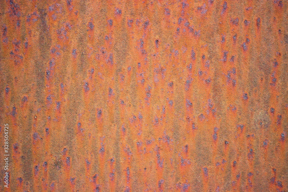 Fototapeta premium Brown rusted metal surface with dark spots