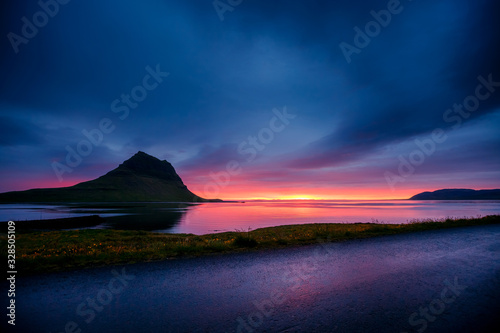 Great sunset over the Atlantic ocean. Location place Kirkjufell volcano the coast of Snaefellsnes peninsula, Iceland, Europe.