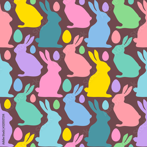 Multicolored Easter eggs and rabbits. Seamless pattern. Texture for fabric  wrapping  wallpaper. Decorative print. Vector illustration .