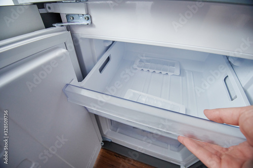 Open fridge freezer container photo