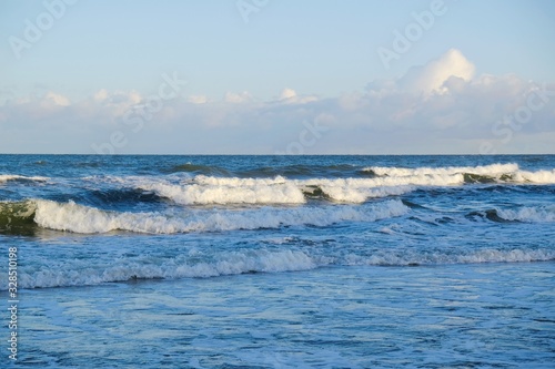 Waves crashing on the breakwater in stormy weather. Baltic Sea coast  Dziwnowek  Poland