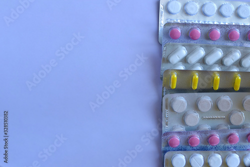 Row of pills on the right. Copy space on the left.