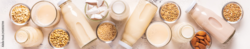 A bottles of alternative milk and ingredients. A bottles of alternative milk and ingredients.