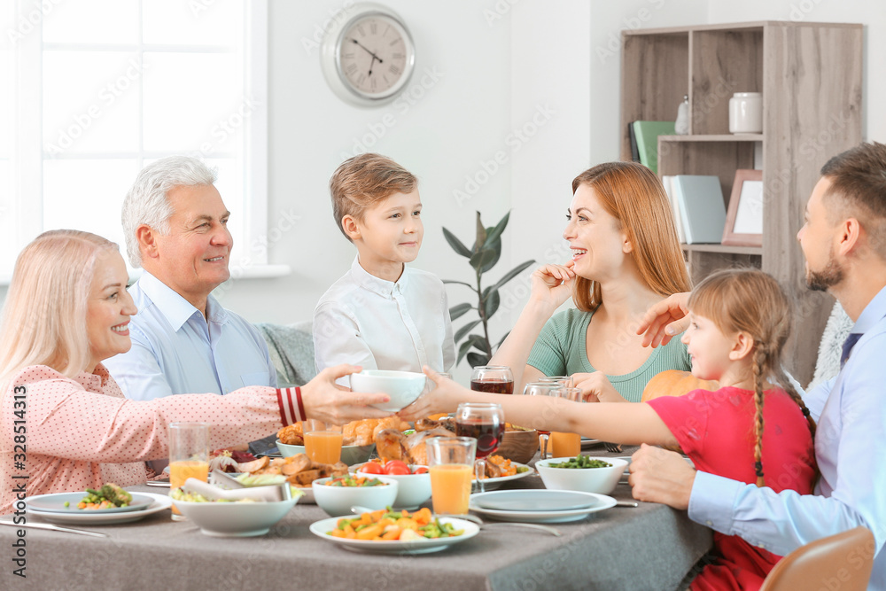 Family celebrating Thanksgiving Day at home