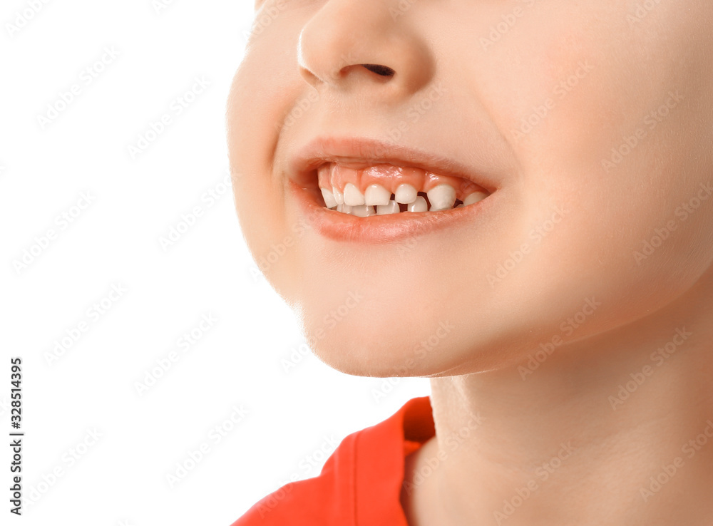 Obraz premium Happy smiling little boy on white background, closeup
