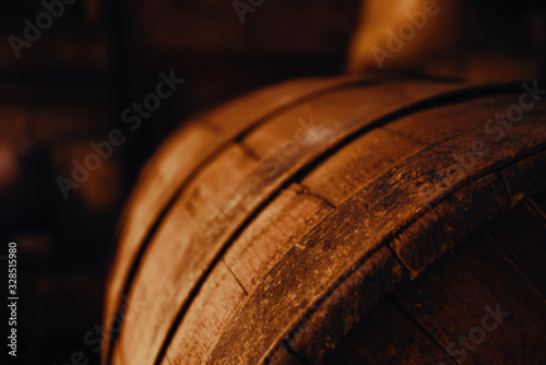 Photographie Beer barrel close-up. Oak barrel texture