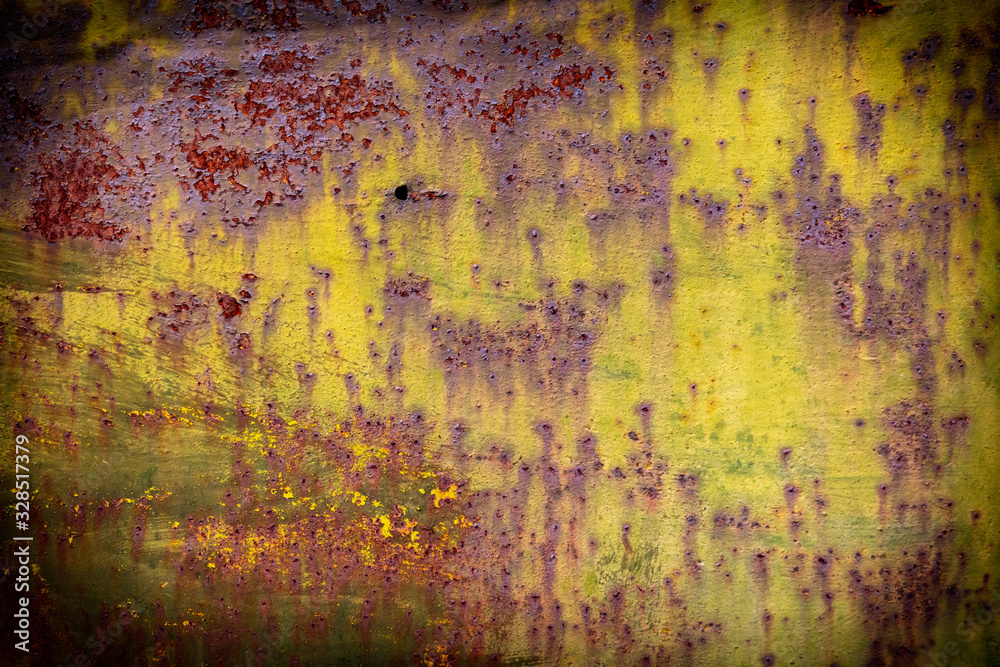 Old rusty metal painted with paint as an abstract background