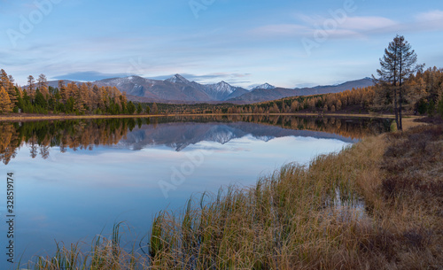 Beautiful autumn mountain lake and mountains