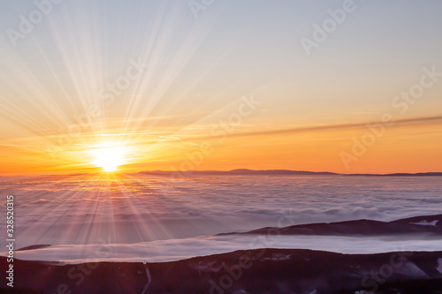 view to sunrise with inversion from the higest mountain of Czech Republic- Snezka. photo