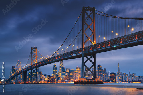 San Francisco downtown with Oakland Bridge in foreground. California famous city SF. Travel destination USA