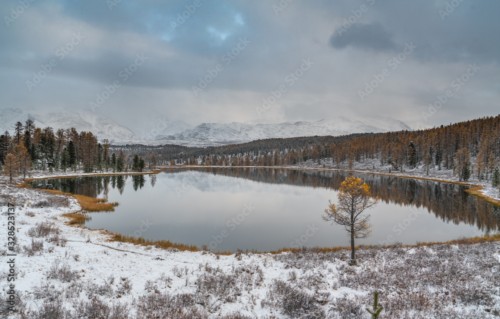 Beautiful autumn mountain lake and mountains