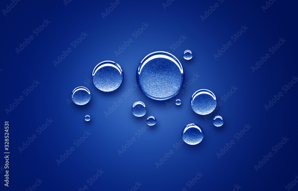 Wassertropfen auf einem blauem Untergrund close up