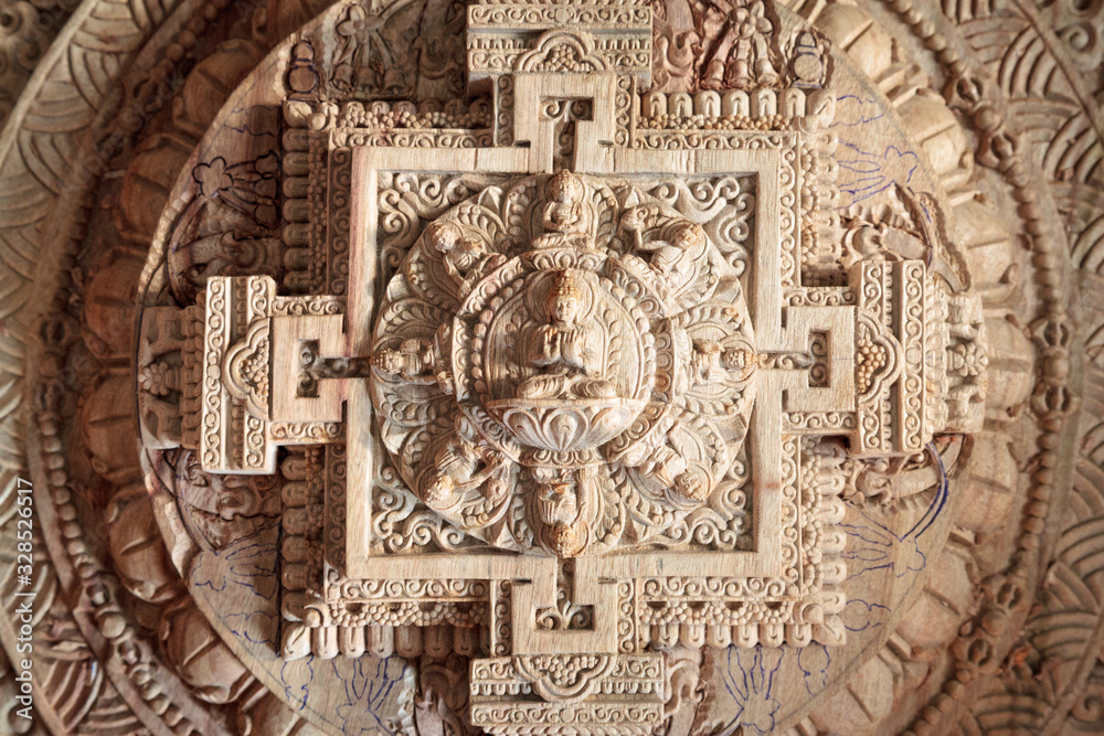 Naklejka premium Wooden carved Mandala