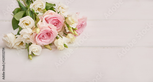 Spring card template. Happy Birthday or Valentine. Women's Day. Greeting card for mother's day. Congratulation with Easter. Flower card. Copy space. Wedding invitation. Roses on white background © Aleksandr