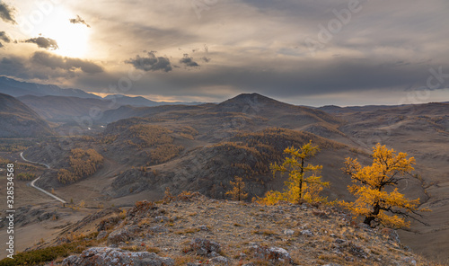 Beautiful road among autumn mountains