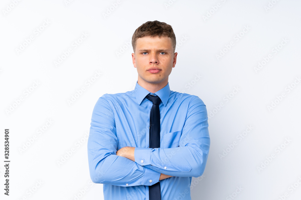 Young handsome businessman keeping arms crossed Young handsome businessman keeping arms crossed