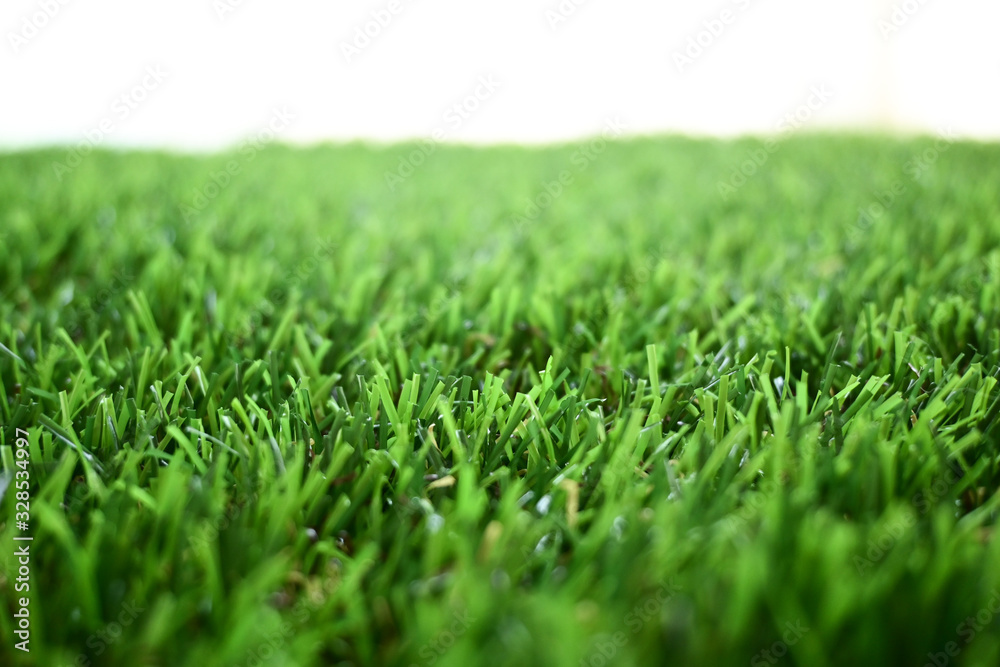 empty green grass turf floor artificial with white background empty green grass turf floor artificial with white background