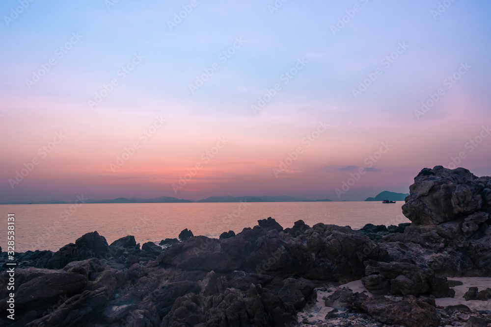 Rocks and sea long exposure landscape in Sunset Rocks and sea long exposure landscape in Sunset