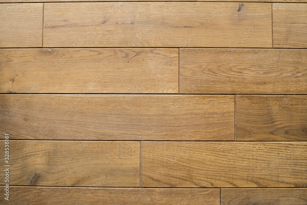 Fototapeta premium Ceramic tile with a wood texture on a kitchen or living room.