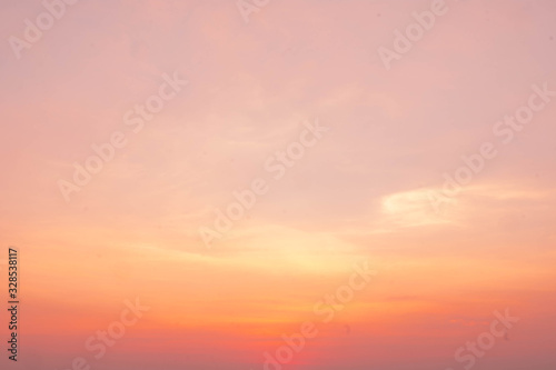 Dramatic sunset and sunrise sky Sky gradient from yellow and pink sunset © phungatanee