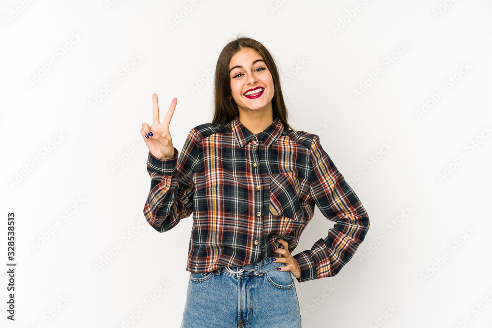 Young caucasian woman isolated on white background showing number two with fingers. Young caucasian woman isolated on white background showing number two with fingers.