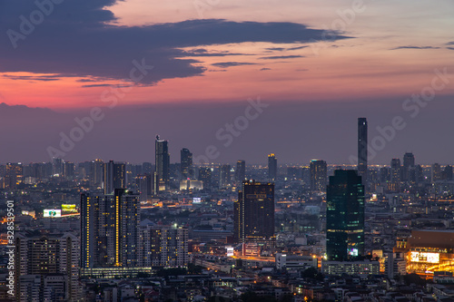 Sky view of Bangkok with skyscrapers in the business district in Bangkok in the evening beautiful twilight give the city a modern style. © num