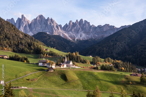 Countryside sunny autumn view of the St. Magdalena  Santa Maddalena in the National Park Puez Odle