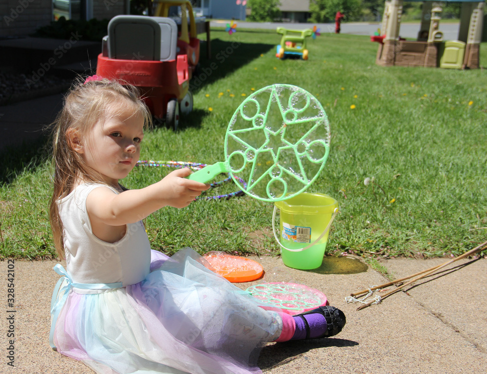 Fototapeta premium Young girl with bubbles