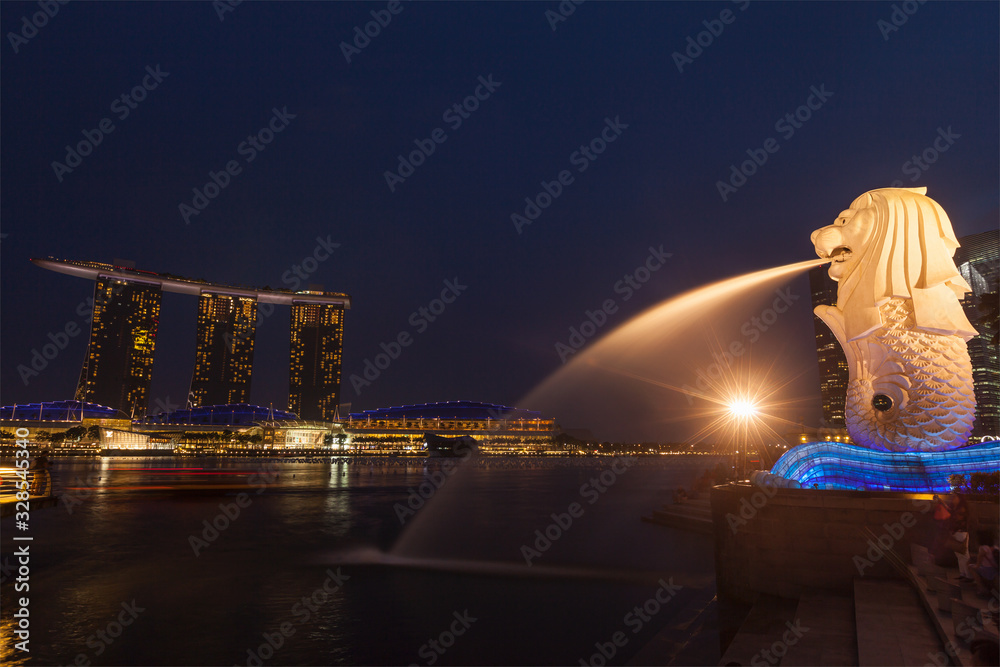 Night View Of Singapore Merlion At Marina Bay And Marina Bay San Stock night-view-of-singapore-merlion-at-marina-bay-and-marina-bay-san-stock