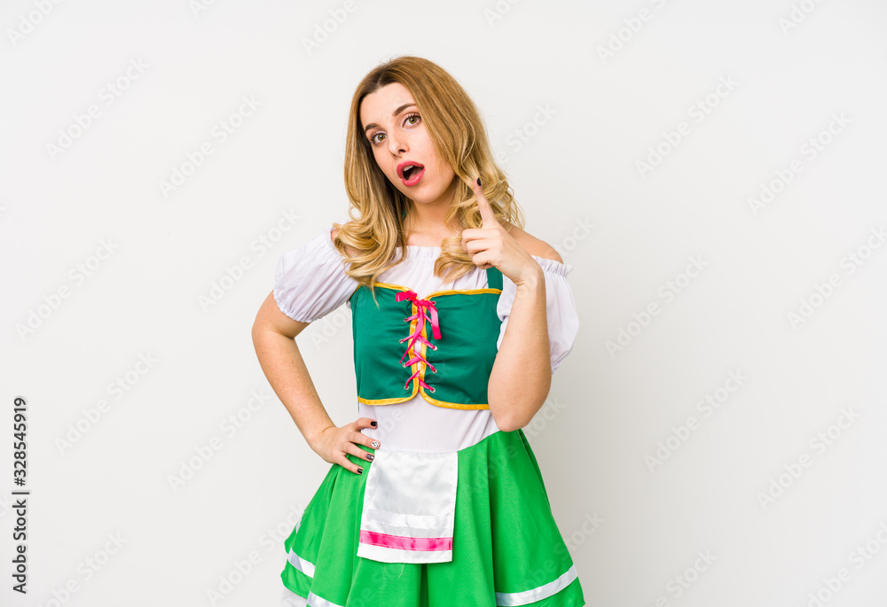 Young woman wearing a saint patricks day clothes isolated having an idea, inspiration concept. Young woman wearing a saint patricks day clothes isolated having an idea, inspiration concept.
