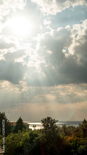 God speaking, clouds, breaking through