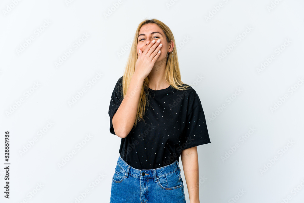 Young blonde woman isolated on white background laughing happy, carefree, natural emotion. Young blonde woman isolated on white background laughing happy, carefree, natural emotion.
